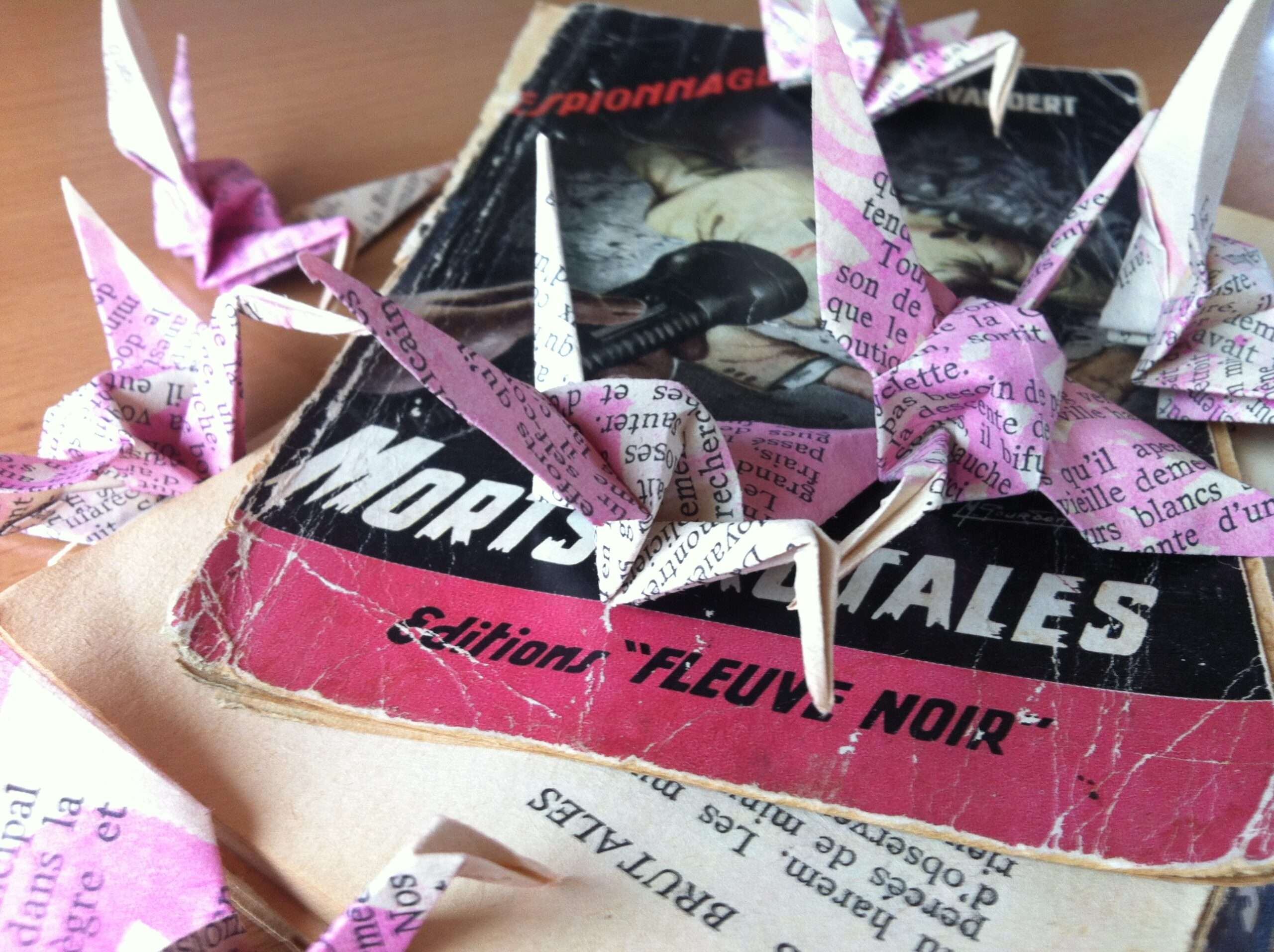 Origami cranes made out of old books