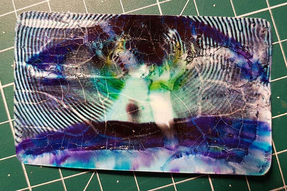 the belt buckle design after the varnish liquidized the color