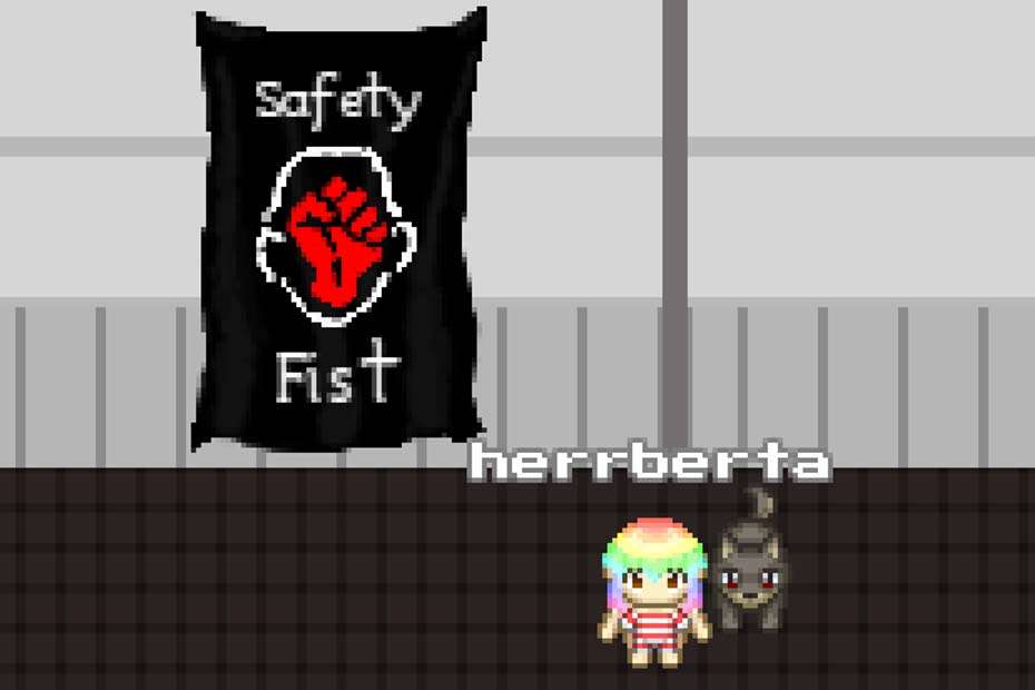 HerrBerta's avatar in the rC3 2D world next to a banner which reads "Safety fist"